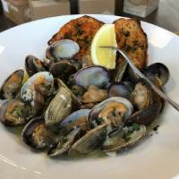 Steamed Clams · White wine butter sauce.