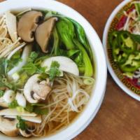 Pho Chay — Vegetarian · Vegetarian. Vegetable rice noodle soup with tofu, mushrooms, bok choy, and a side of fresh h...