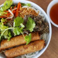 Bun Thit Nuong · Cold vermicelli noodles salad with bean sprouts, lettuce, cucumber, pickled carrot, herbs, c...