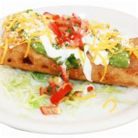 Chimichanga Chicken Burrito · Topped with guacamole, sour cream, and cheese.