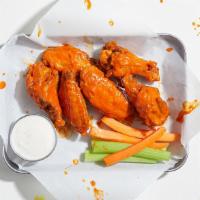 6 Piece Chicken Wings · 6 hot wings with out signature buffalo sauce.