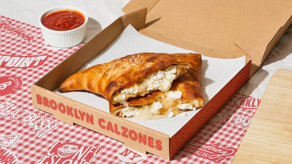 Brooklyn Calzone · Classic Calzone with creamy ricotta cheese and mozzarella cheese, and a side of marinara. (v)