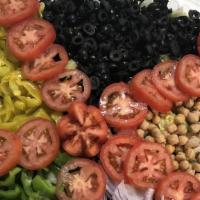 Greek Salad · Romaine Hearts, Red Onion,  Sun-dried Tomatoes,  Feta Cheese, Kalamata Olives, Cucumber, Red...