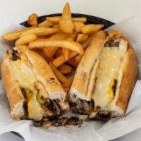 Philly Cheesesteak · Grilled White Onions, American & Provolone Cheese.