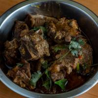 Lamb Curry With Rice · Lamb curry with rice and chutney. 
New packaging with a lower price.