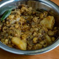 Aloo Mattar · Served with a side of Rice