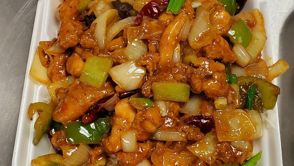 Chilli Chicken With Rice · Spicy.....A popular dish from the Pacific Islands with marinated chicken that  is deep fried and then sautéed in a spicy sauce along with onions and bell peppers.