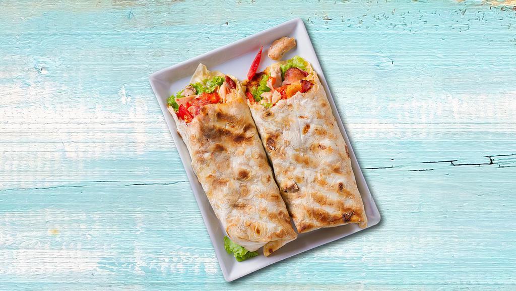 Chicken Caesar'S Wrap Crunch · Chicken and bacon, romaine lettuce, parmesan, caesar dressing, and garlic romano seasoning wrapped to perfection.