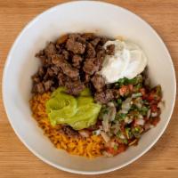 Steak Bowl · Steak, whole beans, rice, pico, sour cream, and guacamole.