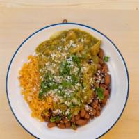 Chile Verde Bowl · Chile Verde, whole beans, rice, cotija, onions, and cilantro.