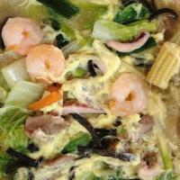 Kouraku Special Ramen / こう楽ラーメン  · Sliced pork, seafood, mushrooms and vegetables in egg drop soup.