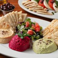 Hummus Trio (A Must) · Combination of Garbanzo, Beet and Edamame Hummus. Blended with Chopped Garlic and Olive Oil ...