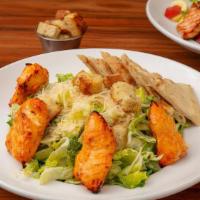 Caesar Salad* · Romaine Lettuce, House Made Croutons, and Reggiano Parmesan Cheese.