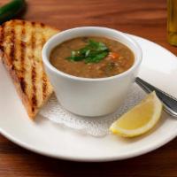 Cup Lentil Soup · Organic Green Lentils, Tomatoes, Garlic, Red Onion, Parsley, Mint, Crushed Pepper in a Veget...