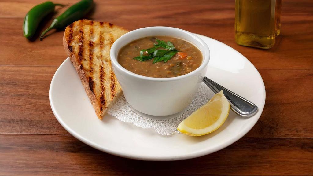 Cup Lentil Soup · Organic Green Lentils, Tomatoes, Garlic, Red Onion, Parsley, Mint, Crushed Pepper in a Vegetable Broth. (TRUE VEGAN) Served with Warm Pita Bread.