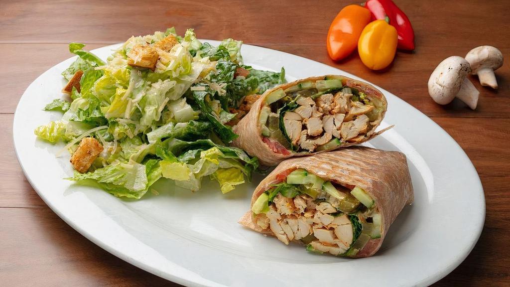 Chicken Wrap · Wayne Farms Grilled Antibiotic Free Chicken, Hummus, Romaine Lettuce, Tomato, Cucumber, Pickle with Fresh Mint and Basil, Wrapped in a Whole Wheat Tortilla.