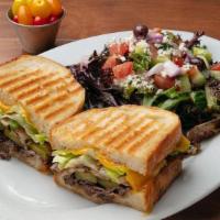 Steak Panini · All Natural Antibiotic and Hormone Free Flat Iron Steak with Grilled Mushrooms, Bell Peppers...