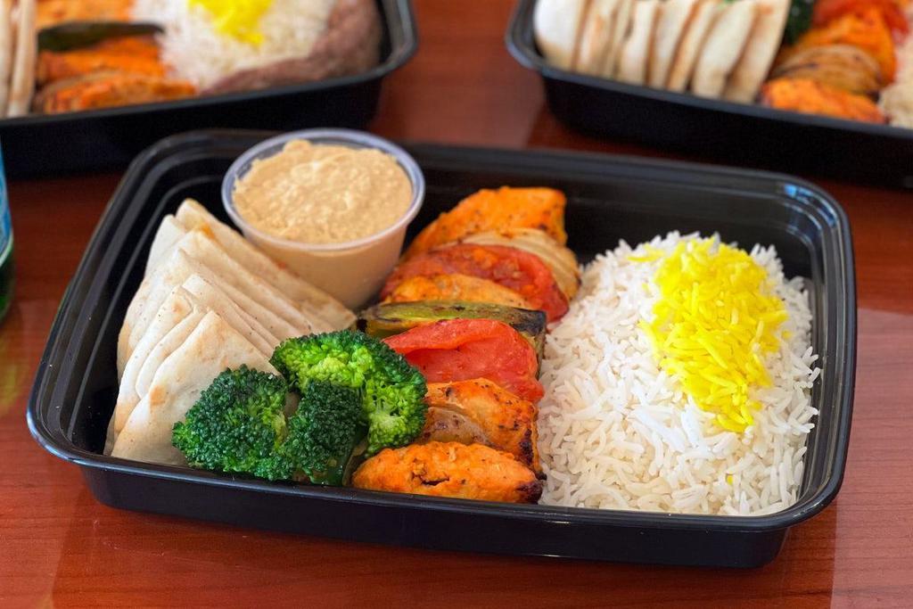Chicken Ka-Box · Charbroiled ABF (Antibiotic & Hormone Free) Chicken Tenders with Grilled Vegetables, Broccoli and Pita Bread. Served with Your Choice of Rice and Spread.