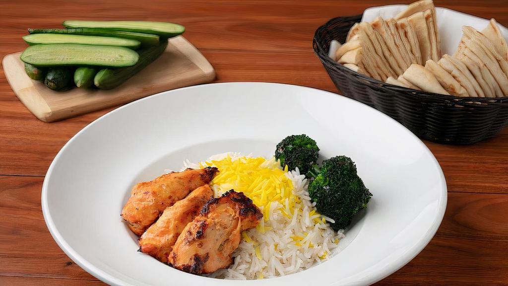 Kids Chicken Plate · Charbroiled Chicken Breast served with Basmati Rice and Grilled Broccoli.