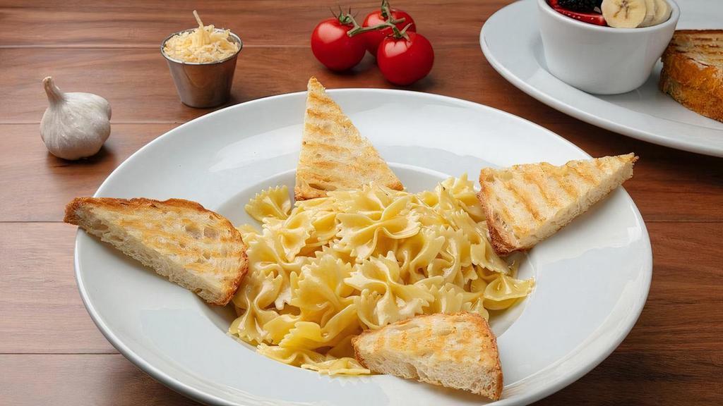 Kids Pasta With Butter · Bowtie Pasta with Butter and Sprinkled with Reggiano Parmesan Cheese. Served with Side of  Bread.