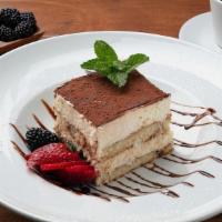 Homemade Tiramisu · Lady Fingers Soaked in Coffee Liqueur & Espresso. Topped with Sweetened Mascarpone Topping.