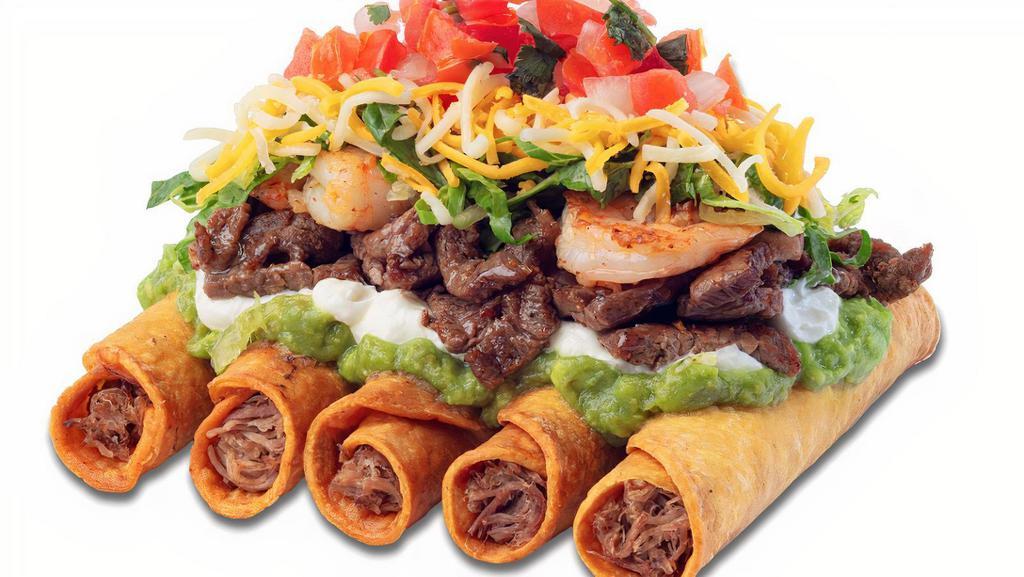 Blue'S Famous Rolled Tacos · 5 shredded beef rolled tacos, sour cream, guacamole, romaine lettuce, cheese, salsa fresca and cotija cheese, topped with carne asada, shrimp and special sauce