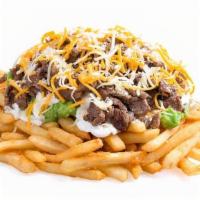 Large Carne Asada Fries · Angus steak, cheese, guacamole, sour cream, and cotija cheese