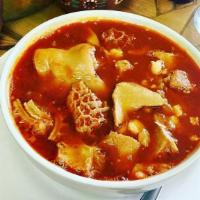 Menudo (Beef Tripe Soup) · Beef tripe with or without hominy, served with condiments &  choice of tortillas.