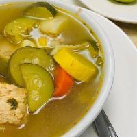 Caldo De Pollo (Chicken Soup) · Chicken soup, with fresh cut vegetables, served with a side of rice & choice of tortillas.