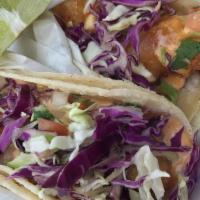 Fish Taco · Fried or Grilled Fish, cabbage, pico, and creamy house sauce.
