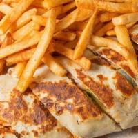 Chicken Shawarma Plate · Sliced wrap of a Chicken Shawarma served with Hummus and Fries.