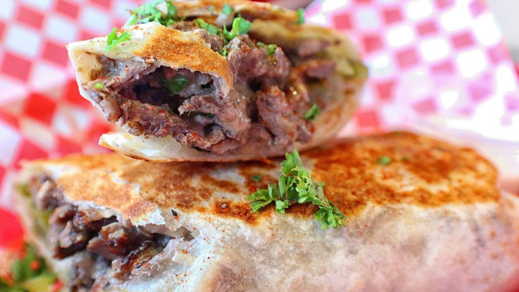 Beef Shawarma Wrap · Authentic Recipe of Beef Shawarma with 
 delicious fresh pickles and its special sauce.
(Good size of a wrap)