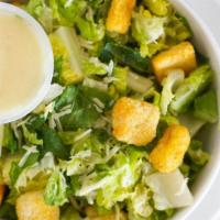 Caesar · Gluten friendly with changes. Crisp romaine lettuce topped with Parmesan cheese and croutons...