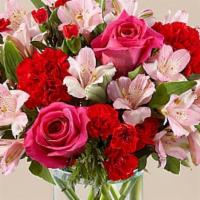 You'Re Precious Bouquet · Blushing shades of pink blooms are nestled in lush greens to charm anyone's day. This bouque...