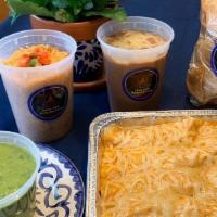 10 Enchiladas Family Meal · 10 enchiladas with ranchera sauce. Choose up to two: beef, chicken or cheese. Served with ri...