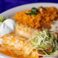 Enchiladas Rancheras · Two beef, chicken or cheese enchiladas topped with homemade ranchera sauce, and melted chees...