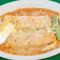 Enchiladas À La Carte · Two enchiladas your choice of chicken, shredded beef, or cheese, topped with sour cream and ...