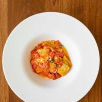 Ricotta Ravioli · Ravioli filled with ricotta and swiss chard, fresh tomato sauce, basil