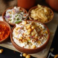 Papri Chaat · Crisp flatbreads topped with yogurt, potatoes, onions, tangy & spicy chutney topped with cri...