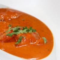 Butter Chicken · Premium chicken cooked in the tandoor oven and then cooked in a butter sauce.