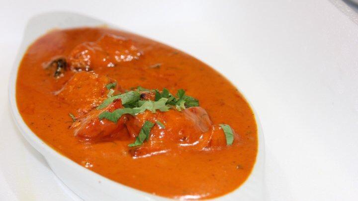 Butter Chicken · Premium chicken cooked in the tandoor oven and then cooked in a butter sauce.
