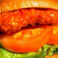 Double Breaded Chicken Sandwich · Hand breaded TWICE natural chicken breast tossed in your choice of sauce layered with fresh ...