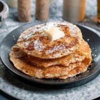 Pncks · 4 griddle buttermilk pancakes with syrup, butter and powdered sugar with your choice of pres...