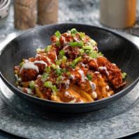 Bffl Frd Chckn Wffl Frs · waffle fries topped with jack cheese, fried chopped buffalo chicken, bacon, scallions + ranch.