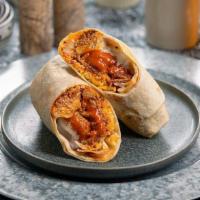 Bffl Chckn Bcn Rnch Wrp · flour tortilla rolled up + stuffed with tater tots, jack cheese, shredded buffalo chicken, b...