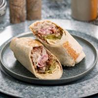 Cbn Wrp · flour tortilla rolled up + stuffed with roasted pork, ham, pickles, brown mustard, gruyere