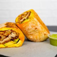 Turkey Bacon, Turkey, Avocado, Egg, & Cheddar Breakfast Burrito · 3 fresh cracked, cage-free scrambled eggs, melted Cheddar cheese, crispy turkey bacon, slice...