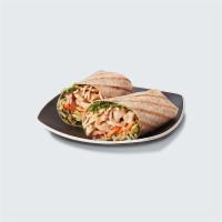 Crunchy Chicken Wrap · Grilled chicken basted with Teriyaki Sauce, Sesame Broccoli Slaw, Green Onions, Pickled Carr...