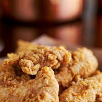 Chicken Tenders · Deep-fried chicken tenders served with your choice of sauce.