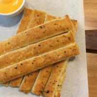 Breadsticks · The best type of thing to dip into our fresh marinara sauce.